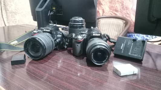 3nikon cameras 2 5100 with 55 and 1 7000 18 140 mm