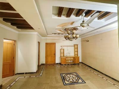 10 Marla tiles floor beautiful uper portion lower lock option available for rent at wapda town j2 block