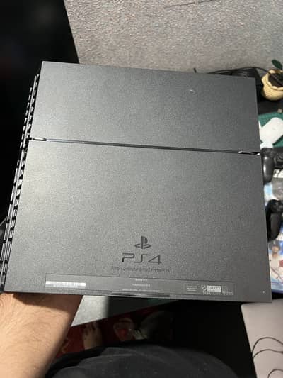 PS4 with 2 Controllers and 5 games - Good Condition