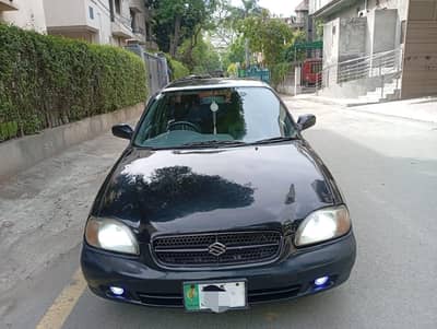 Suzuki baleno JXR 2004 power steering power windows.