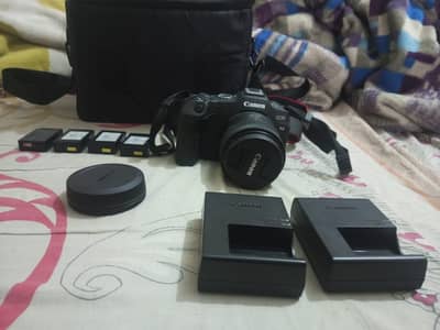 Canon R8 with 24-50mm rf lense along with 4 batteries 2 chargers
