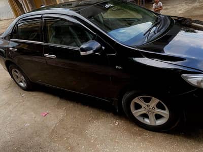 Corolla XLI for tours and booking