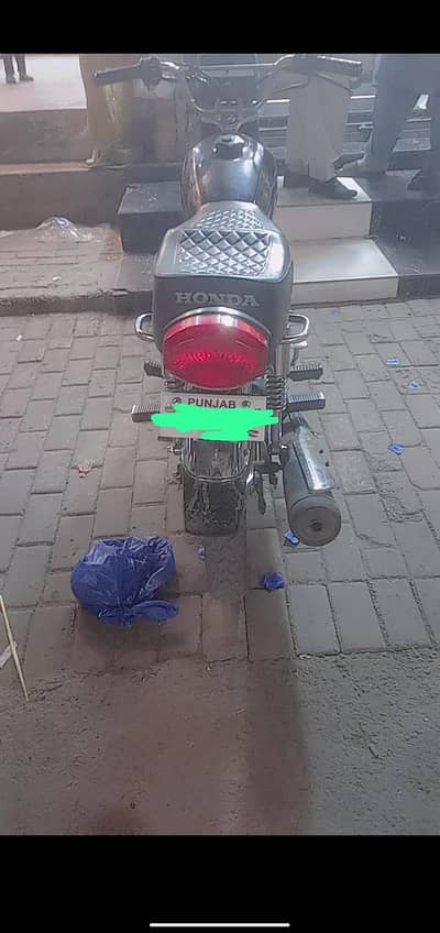 honad 125 Lahore number