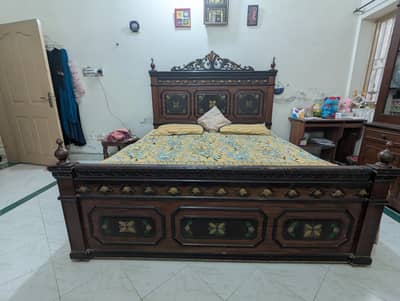 Wooden bed with showcase