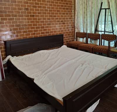 wooden black queen bed