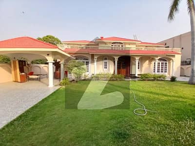 2 KANAL ORIGINAL FAISAL RASOOL SPANISH DESIGN BANGALOW WITH BEAUTIFUL LAWN FOR SALE NEAR TO PARK.