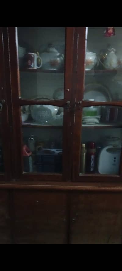 Want to sell wooden showcase in a good condition.