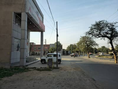 8 Marla Commercial Plot For Sale CCA1, Phase 6 (Facing Park)