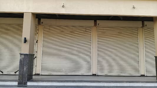 Main Road Sub-Leased Commercial Shop for Sale North Karachi 11-A