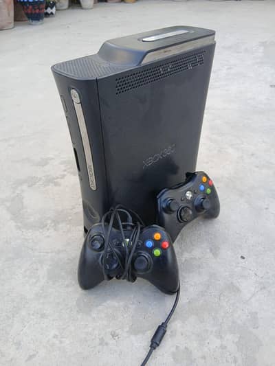 Xbox 360 Slim with 2 controllers