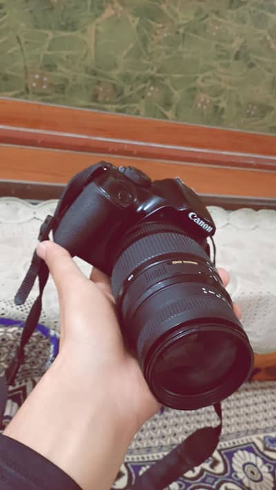 1300D camera Canon and  big lens
