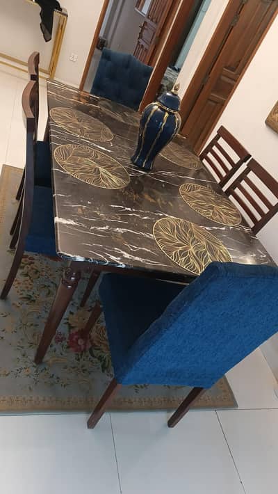 Black marble top dinning table