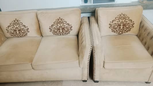 9 seater skin and brown sofa