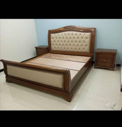 bed with 2 side tables and dressing
