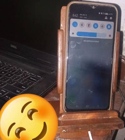 Wooden phone holder.