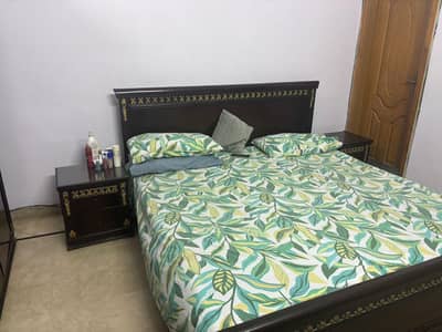 bed, closet and side table