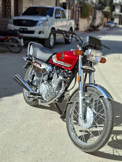 125S selling  colour Red 10/10 condition