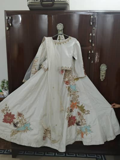 Beautifull hand embrodied white lehnga