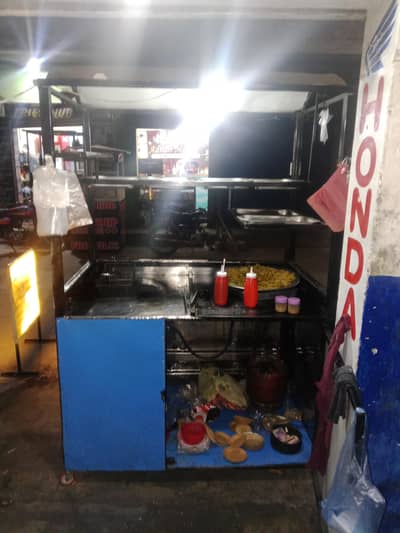 Food stall rehri for sall - chips and samosa roll setup ready