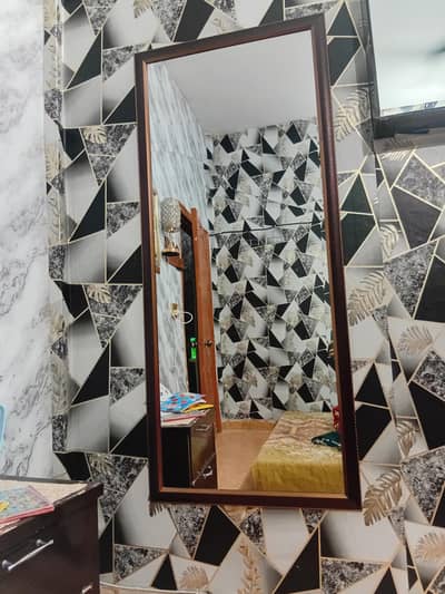 mirror, brown, a little scratched