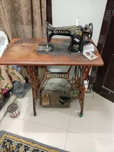 sewing machine stand singer brand