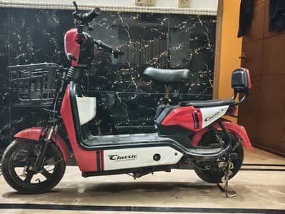 electric red scooty