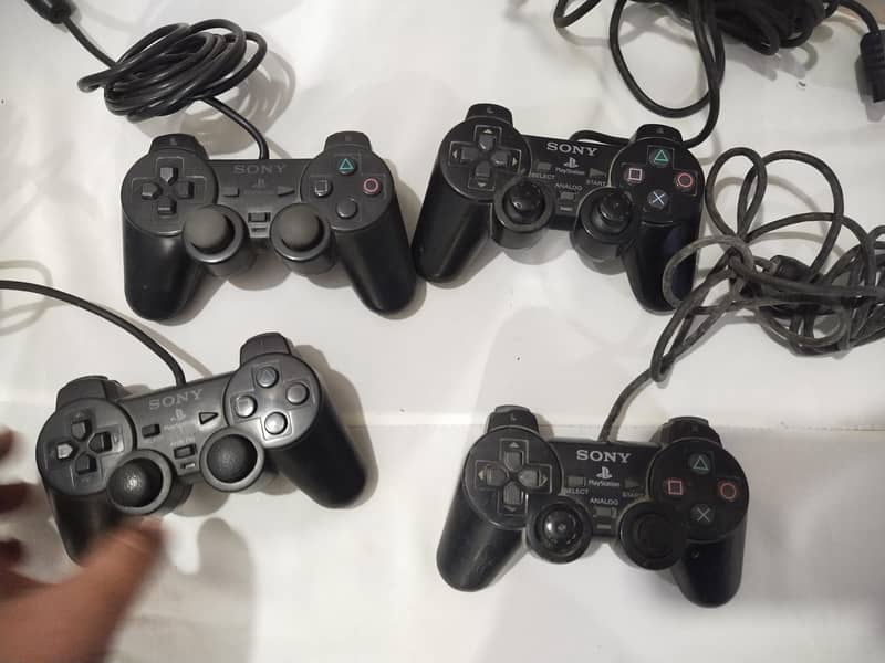 ps2 controller  and 1 ps2 dancing controller 0