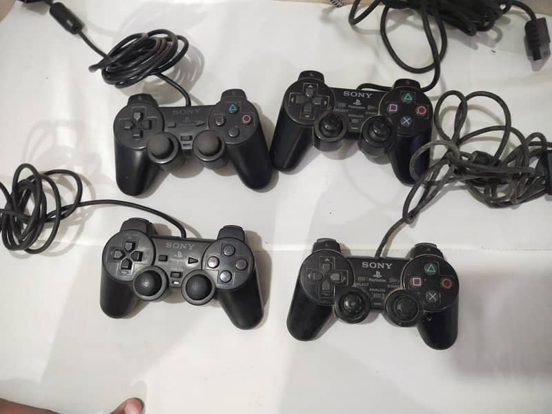 ps2 controller  and 1 ps2 dancing controller 1