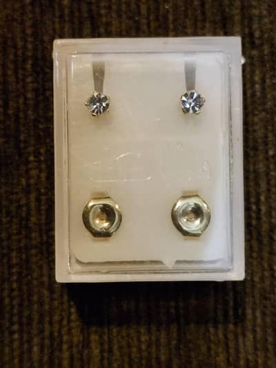 Gold plated piercings Medicated and hypoallergenic.