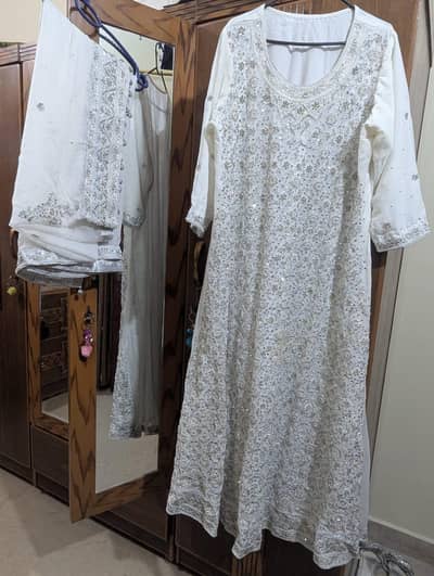 White heavy embroidered maxi / party wear / bridal wear