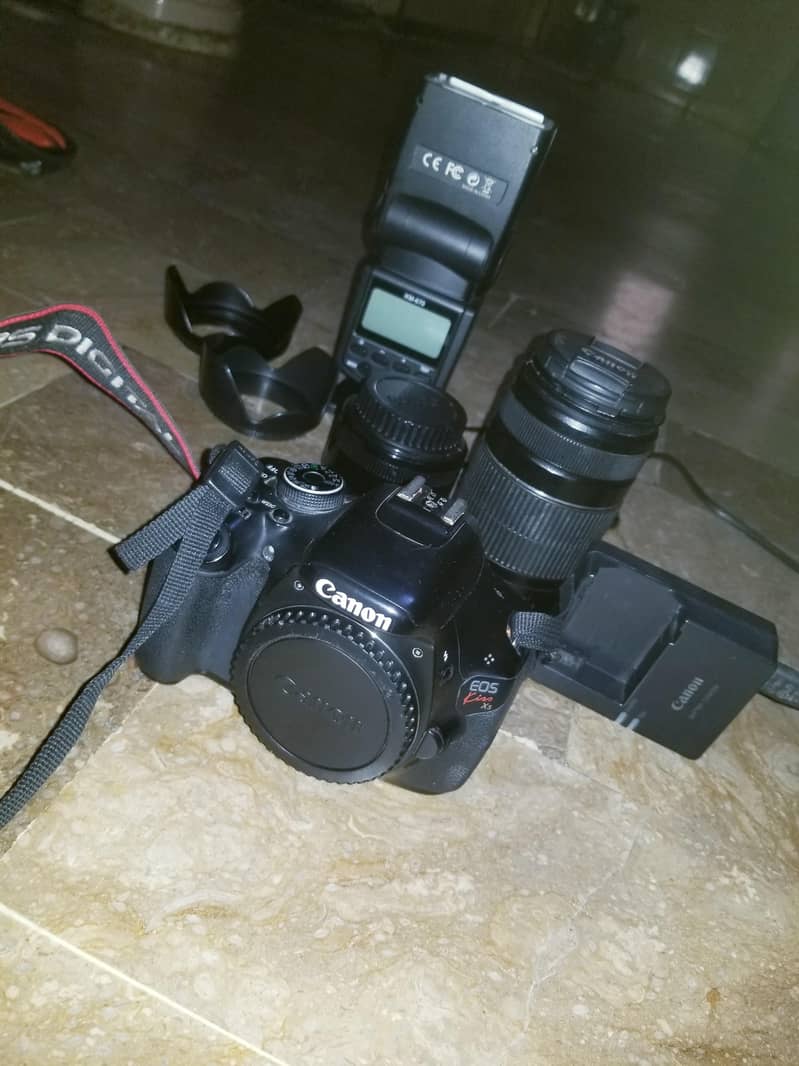camera EOS. X5 1