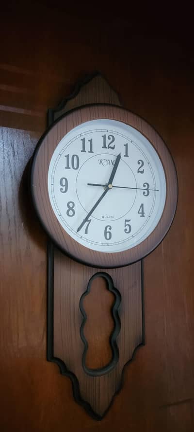 KWC wood themed wall mount watch
