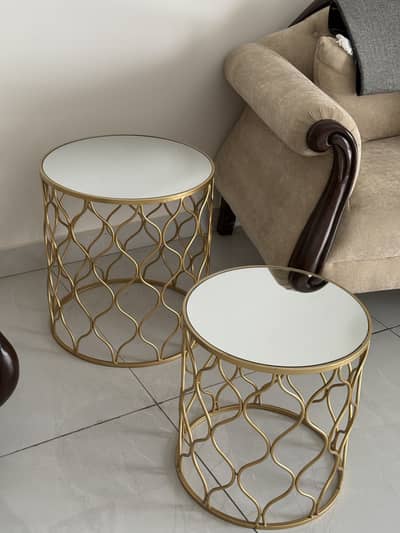 Coffee brass tables with mirror top