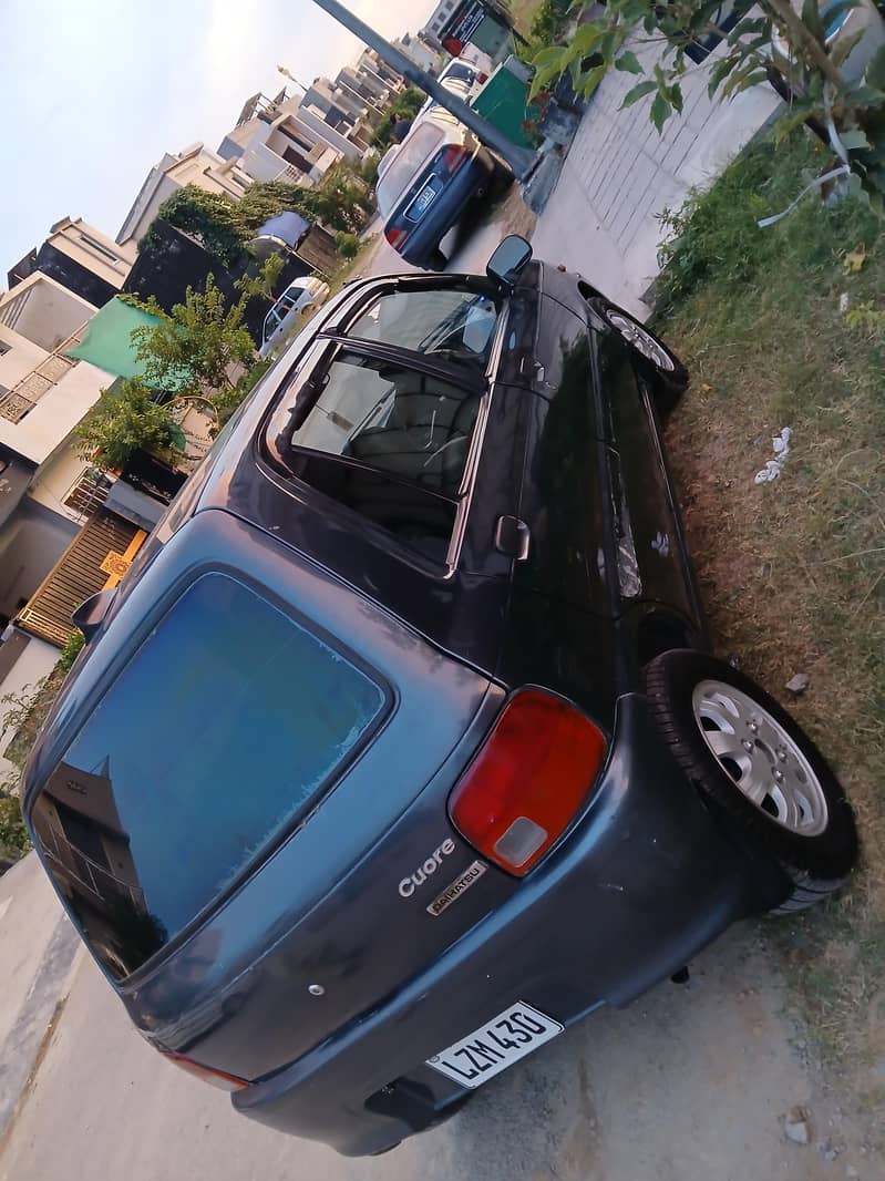 Daihatsu Coure 2005 4