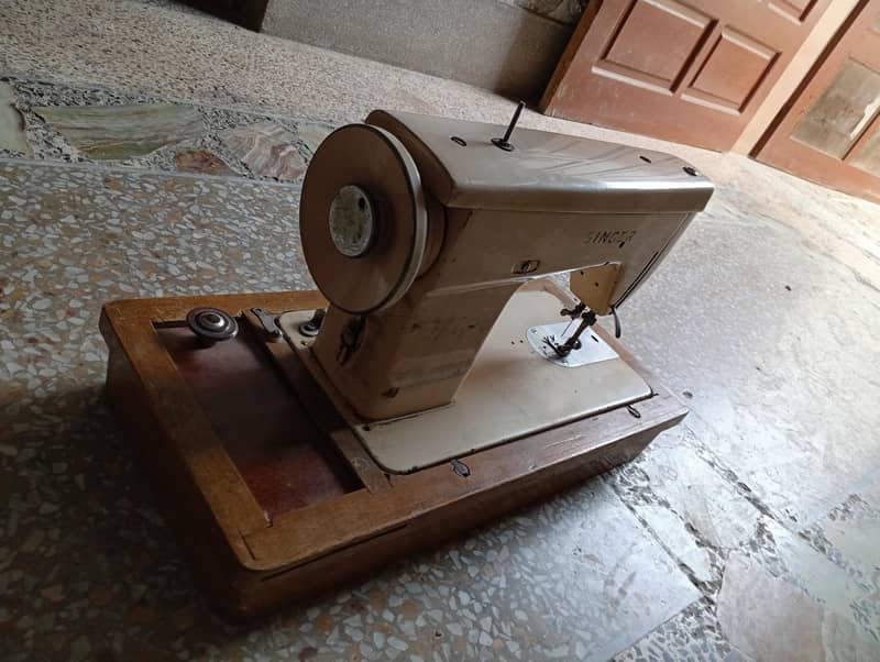 singer machine 1