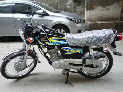 Honda 125 black colour blkl new bike ha Tanki tapa lamination ha