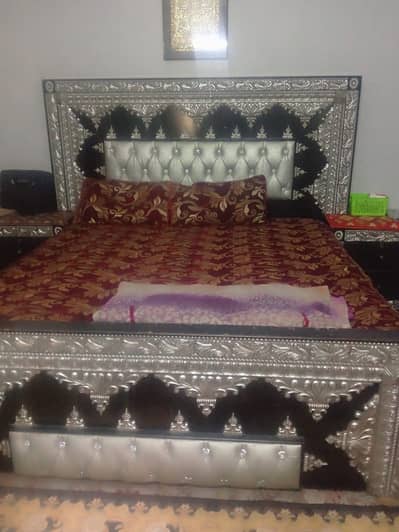 Bed with showcase and side tables