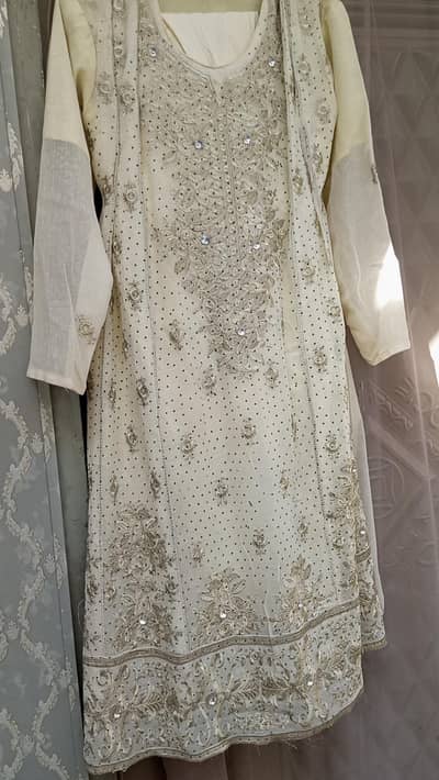 off white colour embroidered dress