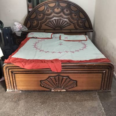 double bed with side tables and mattress