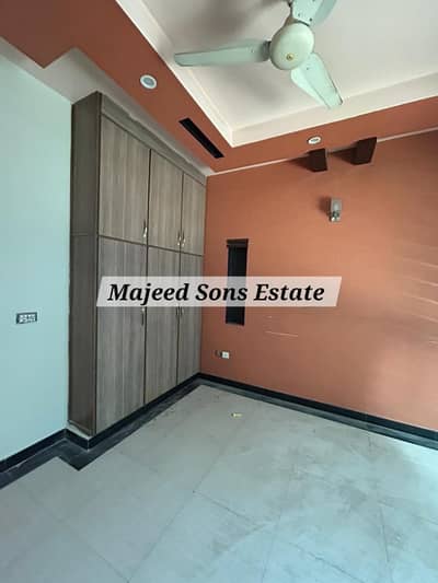 10 marla tile floor luxury fully house is for rent in Wapda Town phase1