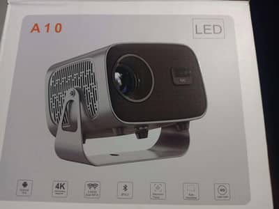 A10 Android projector 2/16 brand new 150inch screen size