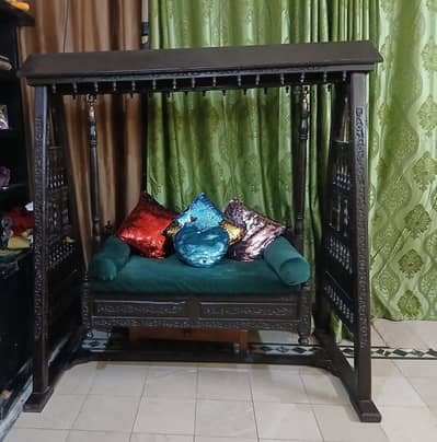 Traditional wooden swing sofa