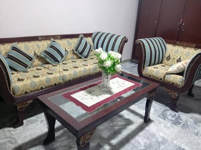 5 seater sofa in very good condition. pure sheesham wood. heavy duty