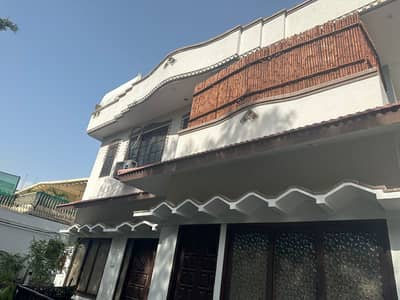 1000 Square Yards Corner Property For Rent Corner Near Shahrah E Faisal Ground Plus 1 With Green Lavish Lawn