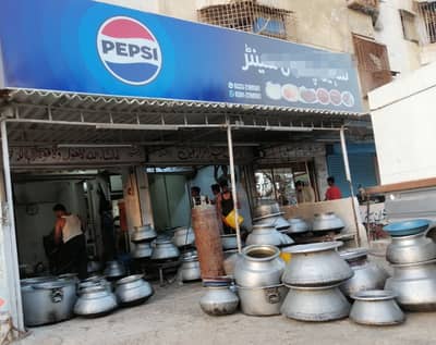 Corner Shop With Attached Bath Extra Land Lease 200 Feet Road Facing Vip Location North Karachi Sector 11A near power house chowrangi