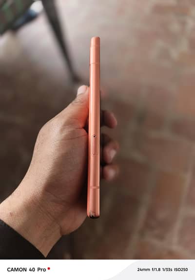 Google pixel 7A with chargee