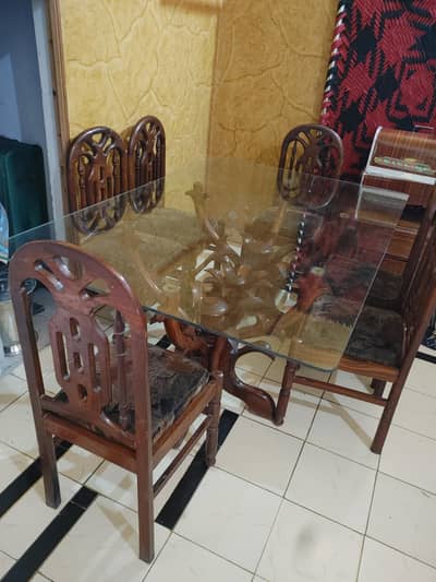 Wooden dining table with heavy glass top for Sale