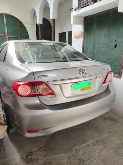 toyota Corolla Gli Full Geniun just one peace touch up