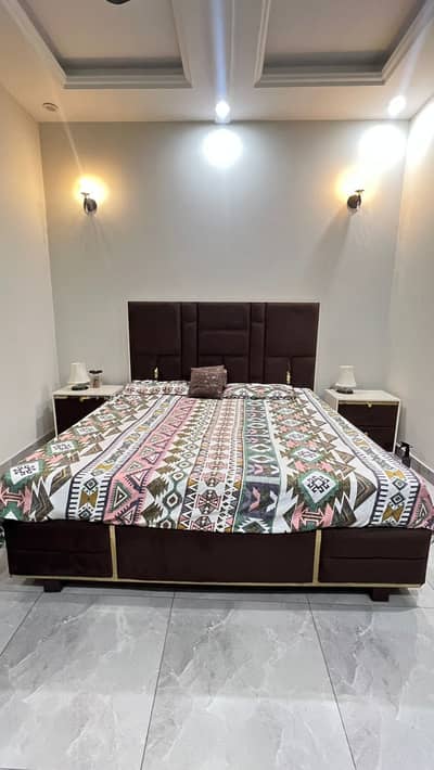 Brown bed set / dressing table/2 side drawers/85k