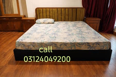 slightly used bed wirh two side tables call 03124049200